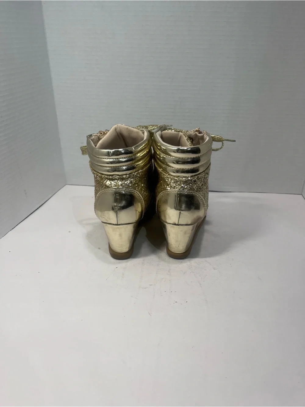 Women’s Gold Glitter Wedge Sneakers